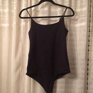 Zara black bodysuit NWOT. Never used. Two snaps at the bottom.